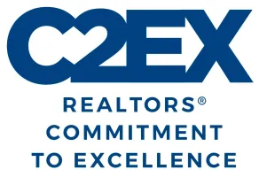 A blue and white logo for realtors
